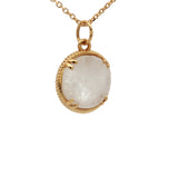 Collier doré médaille coeur texturé et pierre