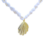 Collier doré coquillage et zircons 80 cm