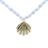Collier doré coquillage et zircons 80 cm