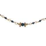 Necklace with stones and golden discs