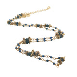 Necklace with stones and golden discs