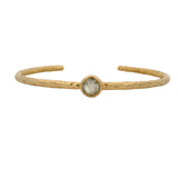 Hammered gold rush and round stone