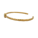 Hammered gold rush and round stone