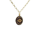 Collier doré médaille oeil et zircons roses 50cm