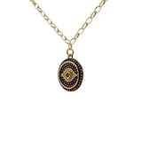 Collier doré médaille oeil et zircons roses 50cm