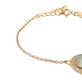 Bracelet doré pierre ovale facettée et zircons