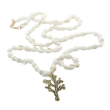 Collier doré coquillages et branche de corail dorée en zircons bleus 80 cm