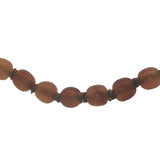 Collier doré perles marrons en corne et noeuds marrons 64 cm