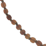 Collier doré perles marrons en corne et noeuds marrons 64 cm