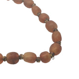Collier doré perles marrons en corne et noeuds marrons 64 cm