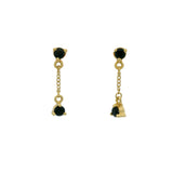 Boucles d'oreilles dorées avec deux onyx noire reliées par une chainette
