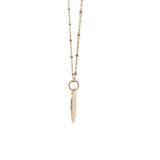 Gold necklace with medal engraved with leaves and "LUCKY YOU"