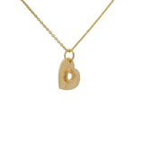 Collier doré et pendentif coeur texturé