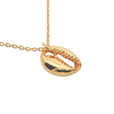 Gold necklace and cowrie pendant