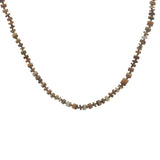 Collier doré avec disques de coquillages beige et blanc 64 cm
