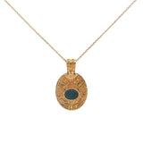 Gold necklace with engraved flower and stone pendant