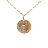 Gold necklace with star and stone medal