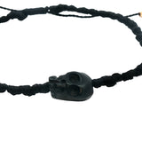 Black skull cord bracelet with gold beads