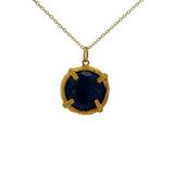 Gold necklace with round stone pendant set with 4 claws