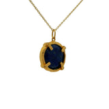 Gold necklace with round stone pendant set with 4 claws