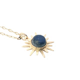 Golden sun and cabochon stone necklace