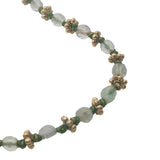Collier doré perles vert clair avec couronnes dorées 42 cm