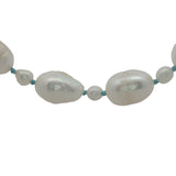 Collier doré alternance petites et grandes perles de culture avec noeuds turquoise 60 cm