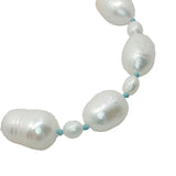 Collier doré alternance petites et grandes perles de culture avec noeuds turquoise 60 cm