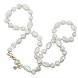 Collier doré perles de culture de différentes tailles avec noeuds beige 50 cm