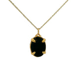 Gold necklace and oval stone set with 4 claws