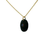 Collier doré onyx noire ovale facettée avec Lapis lazulis