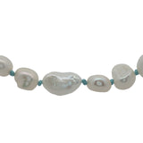 Collier doré perles de culture de différentes tailles avec noeuds turquoise 50 cm