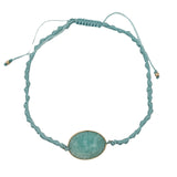 Bracelet cordon bleu turquoise scarabée taillé dans amazonite cerclée de doré