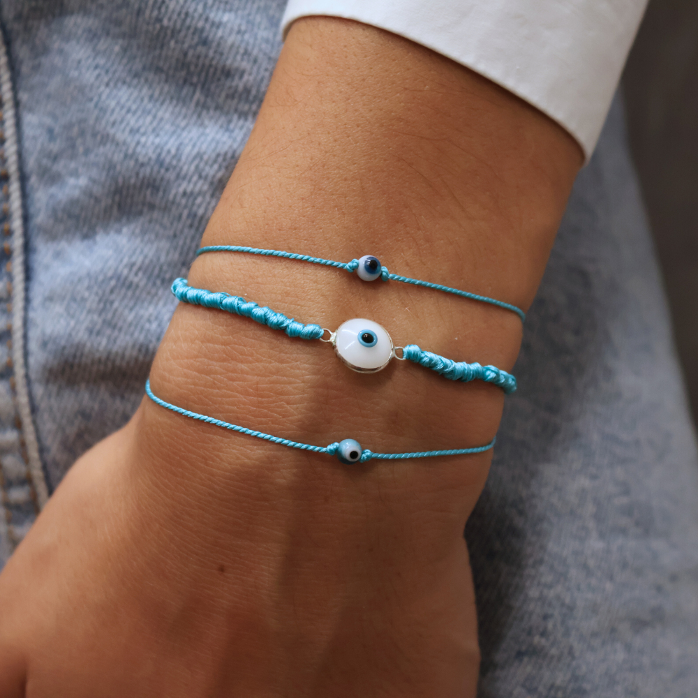 Thick colored cord bracelet and glass eye