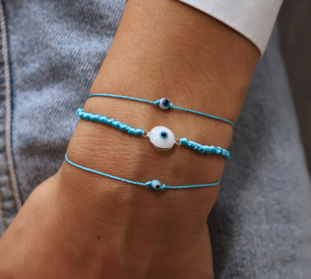 Thick colored cord bracelet and glass eye