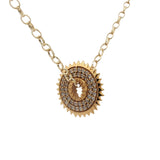 Collier doré médaillon dentelé oeil zircons 42 cm