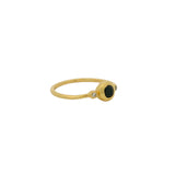 Thin ring with round stone and zircons
