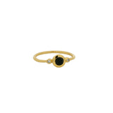 Thin ring with round stone and zircons