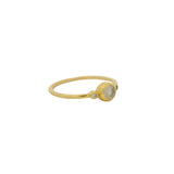 Thin ring with round stone and zircons