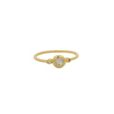 Thin ring with round stone and zircons