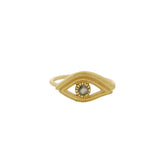 Gold ring with textured eye and stone