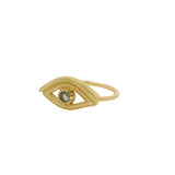 Gold ring with textured eye and stone