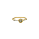Bague dorée pierre ronde et zircons