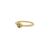 Bague dorée pierre ronde et zircons