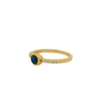 Bague dorée pierre ronde et zircons