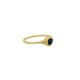 Thin ring with round stone and zircons