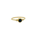 Thin ring with round stone and zircons