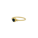 Thin ring with round stone and zircons