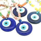 Porte-clefs oeil rond en pâte de verre soufflé bleu mix perles rouges