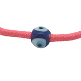 Bracelet doré cordon rose fluo oeil bleu